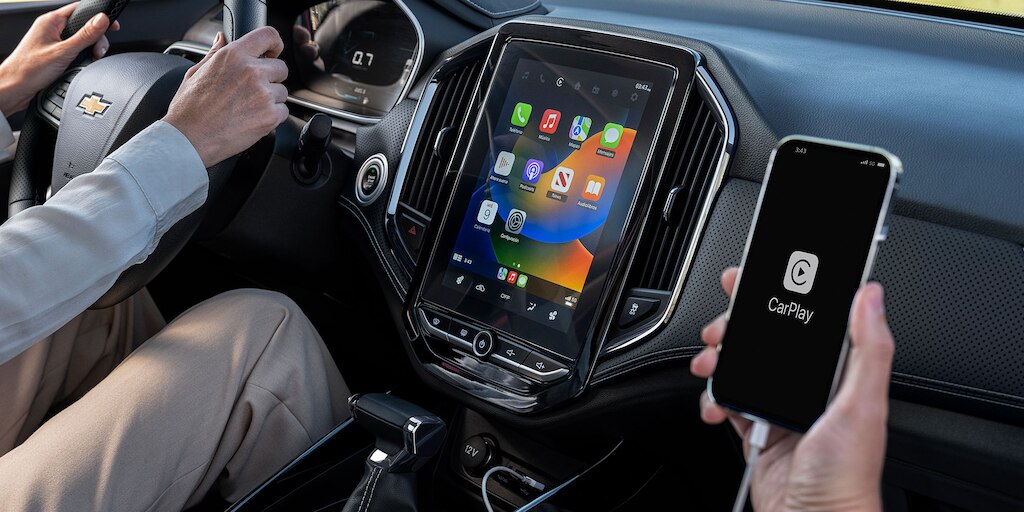 Vista interna Chevrolet Captiva 2025, camioneta familiar con conectividad Apple Carplay y Android Auto